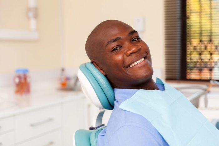 man visiting dentist in Virginia Beach, VA