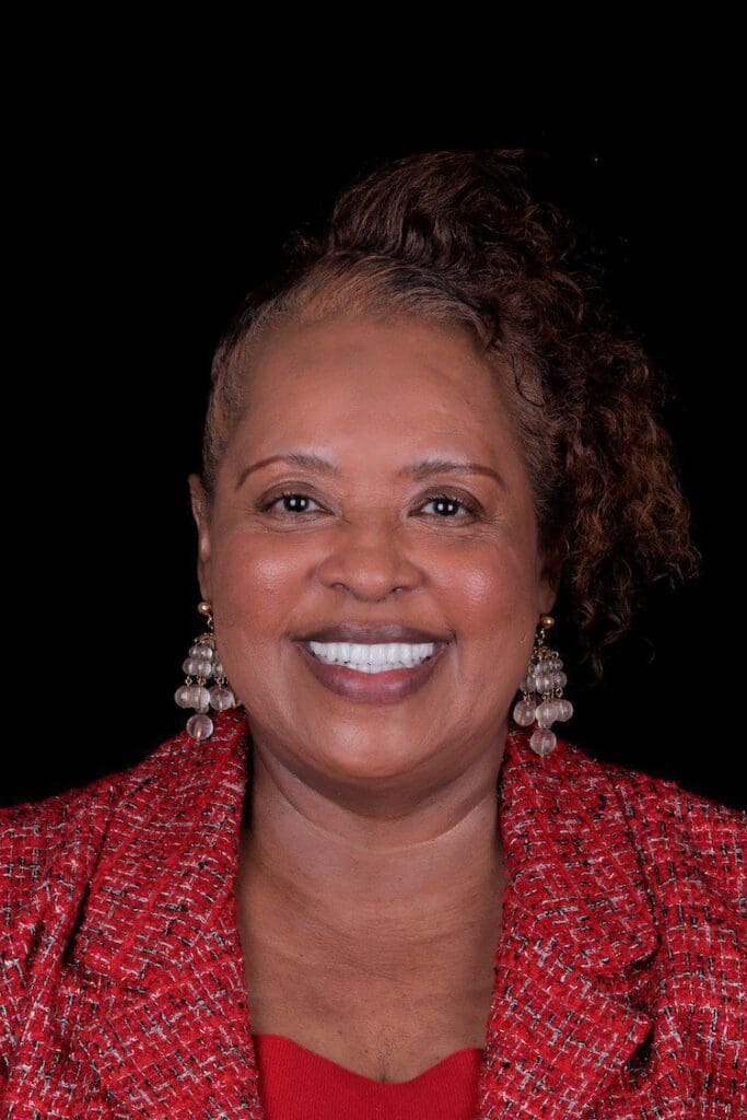 Happy dental patient after getting All-On-4 dental implants